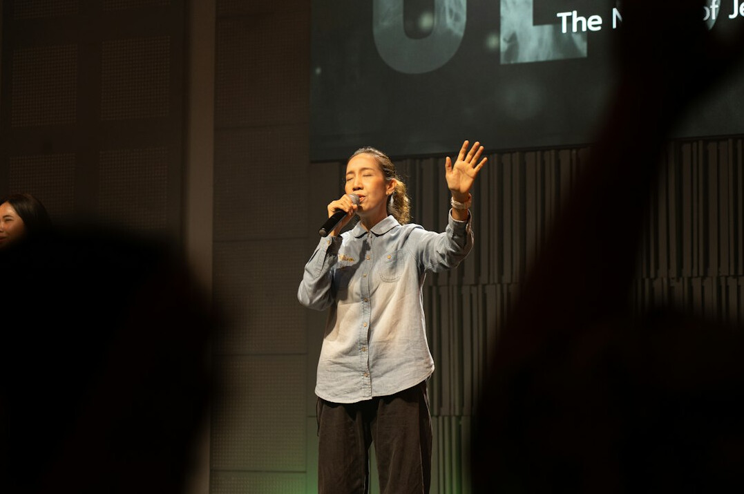 child on stage performing