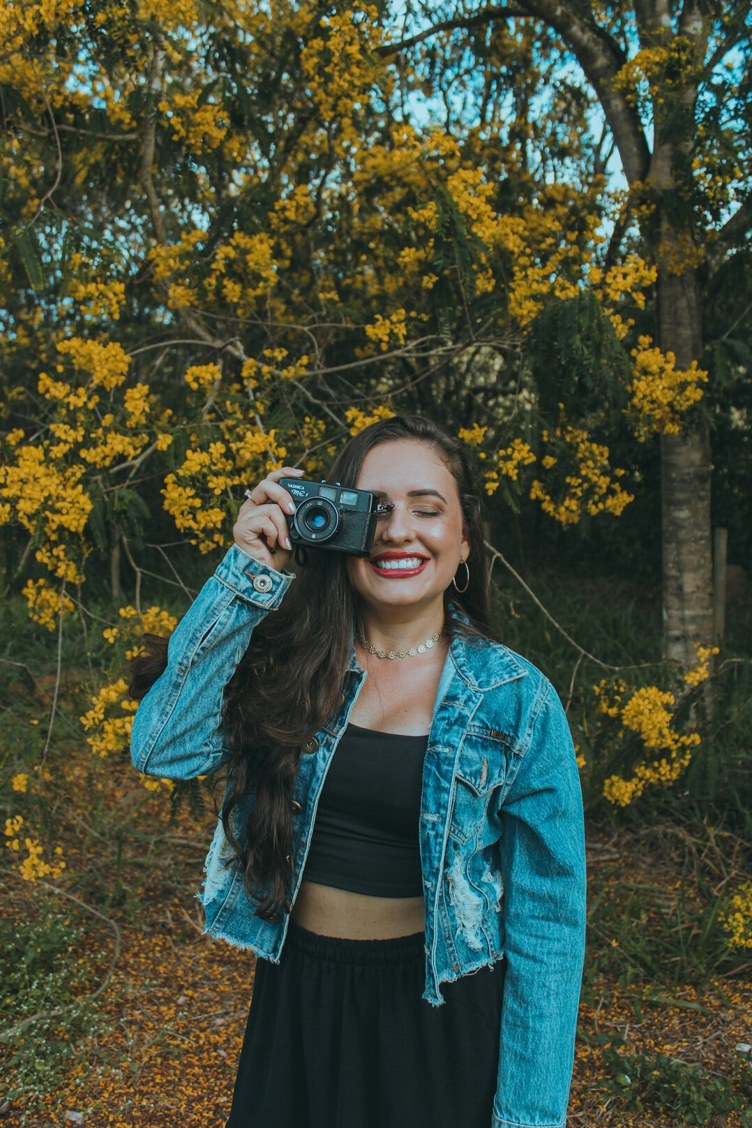 Portrait of a Latina woman photographer smiling